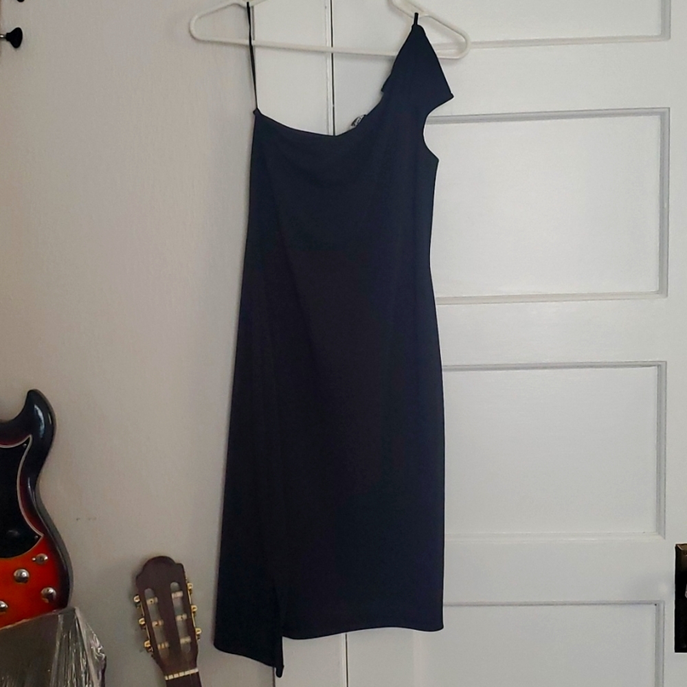 1 shoulder, asymmetrical little black dress.